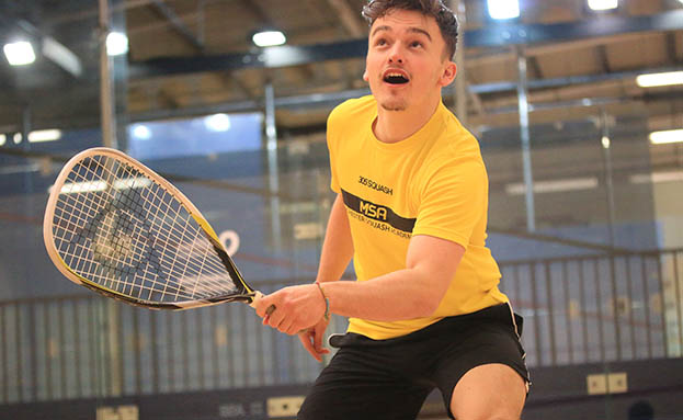 Squash 57 player on a squash court